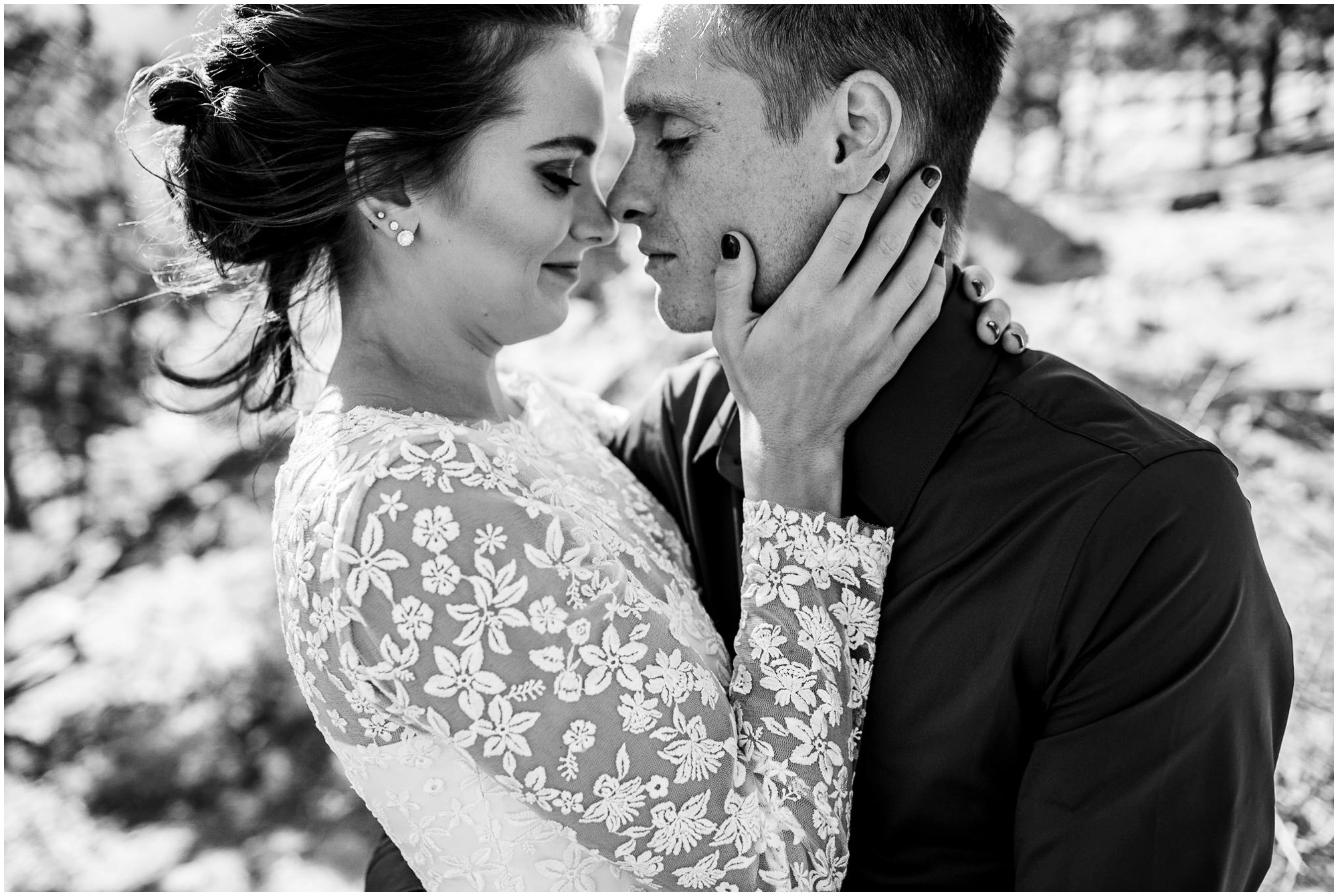 intimate black and white portrait of bride and groom