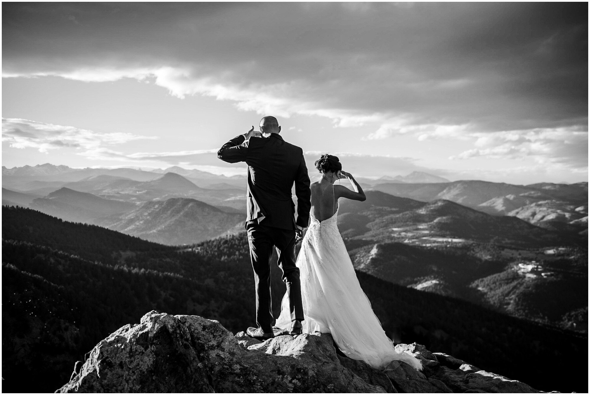 Bride and groom look out over Lost Gulch Overlook