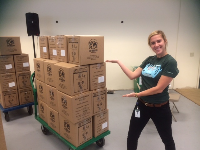 Anna at a Stop Hunger Now event to package food for those in need