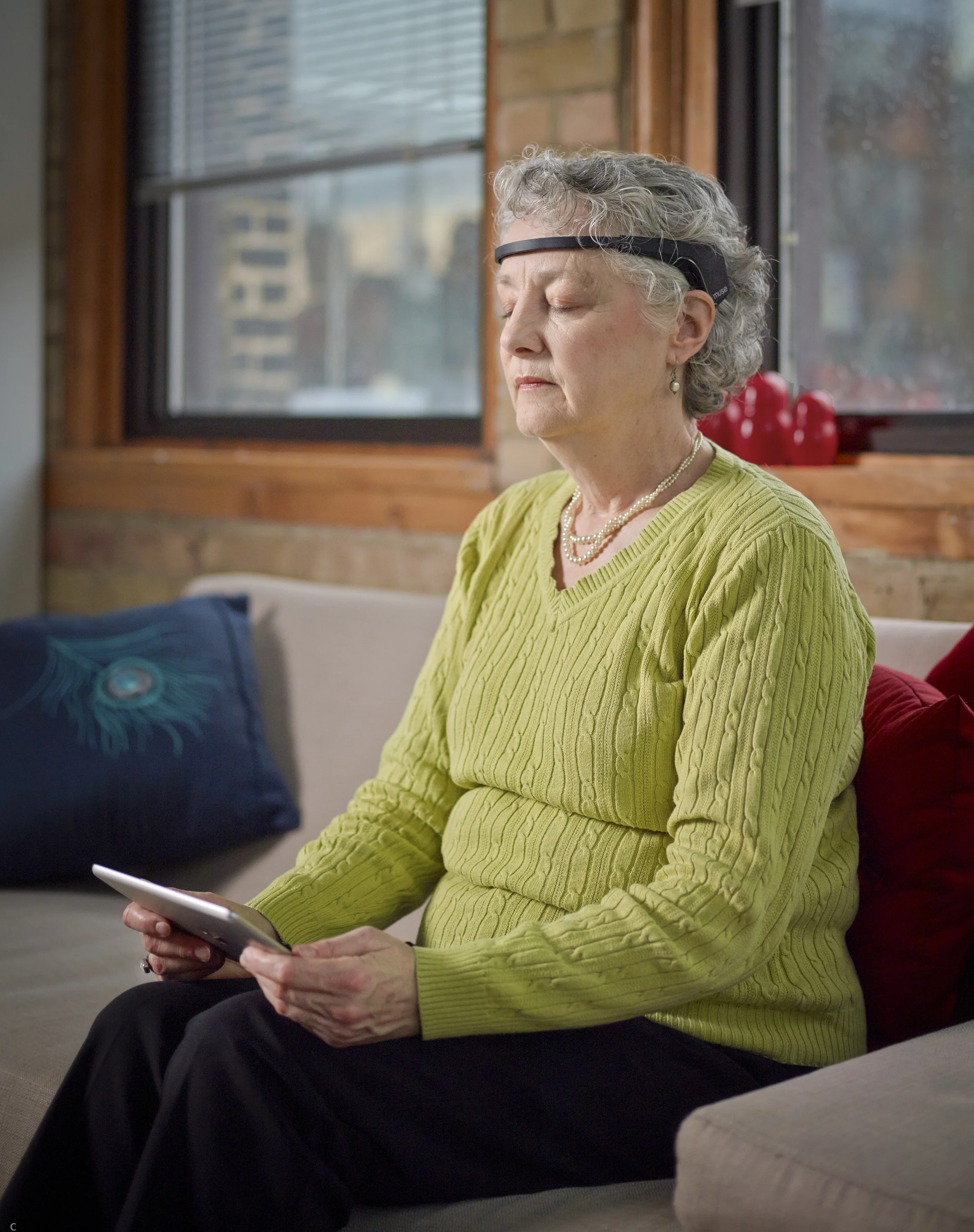 18-Mature woman Musing on Couch.jpg