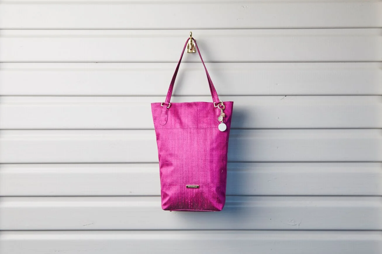 Raw silk bucket bag in fuchsia pink