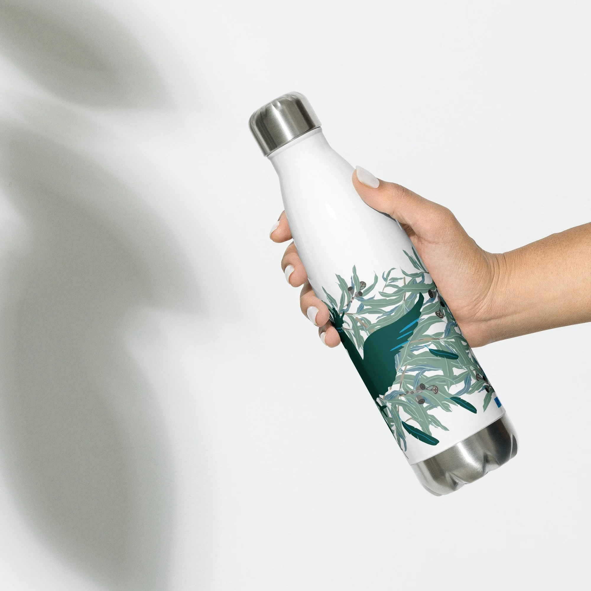 stainless-steel-water-bottle-white-17-oz-left-6939670adc0c0.jpg