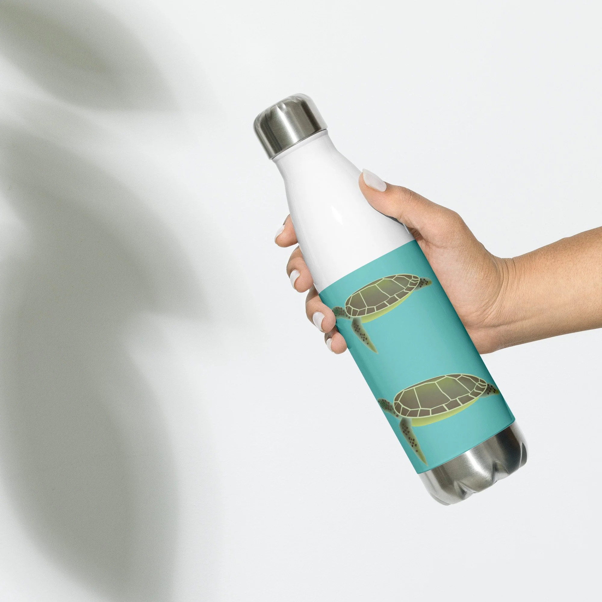 stainless-steel-water-bottle-white-17-oz-left-693a7b1c1547b.jpg