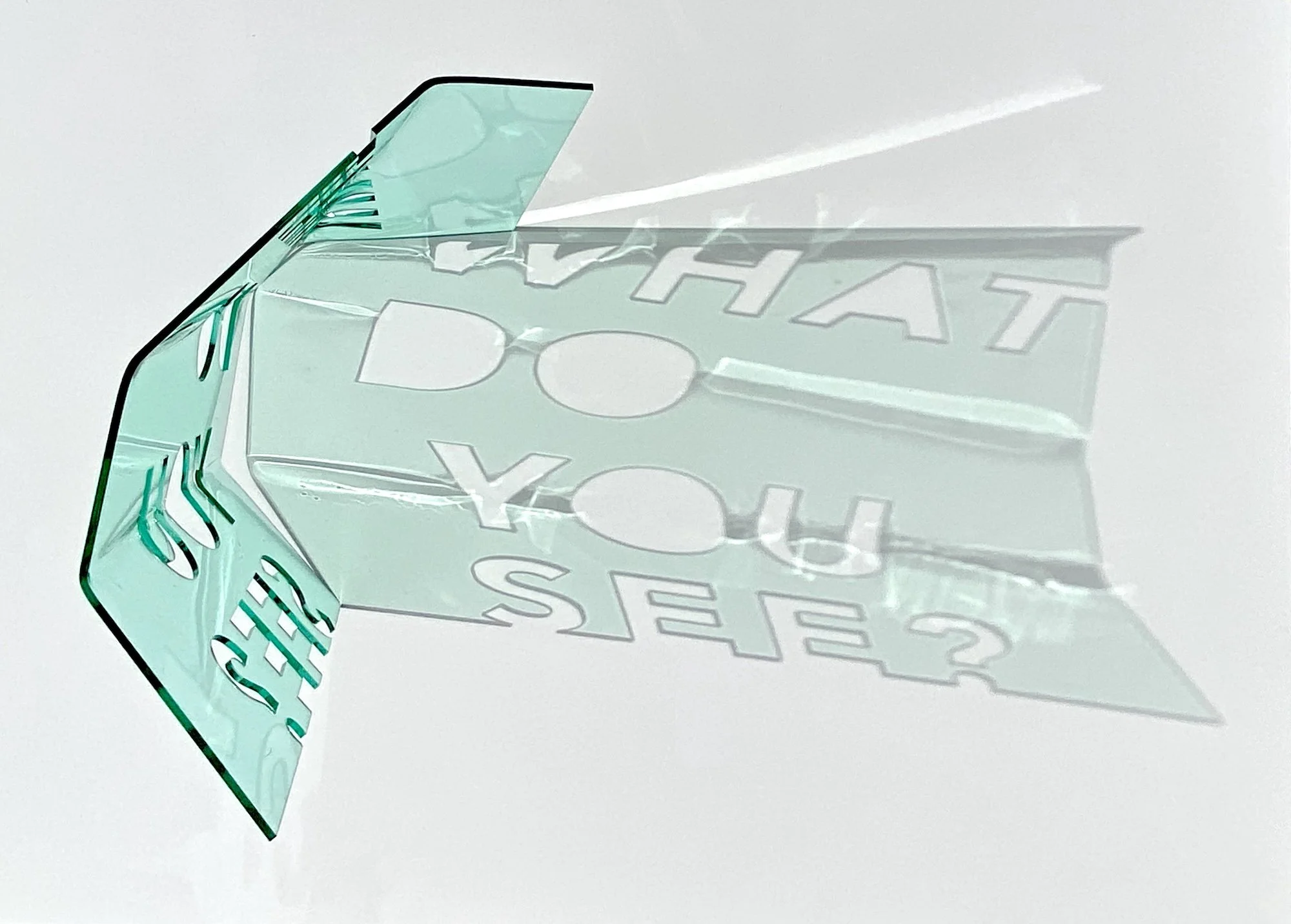   What do you see? (III),  2020 Tinted transparent acrylic, laser-cut and heat-bent 4 x 12 x 12 in. SOLD 