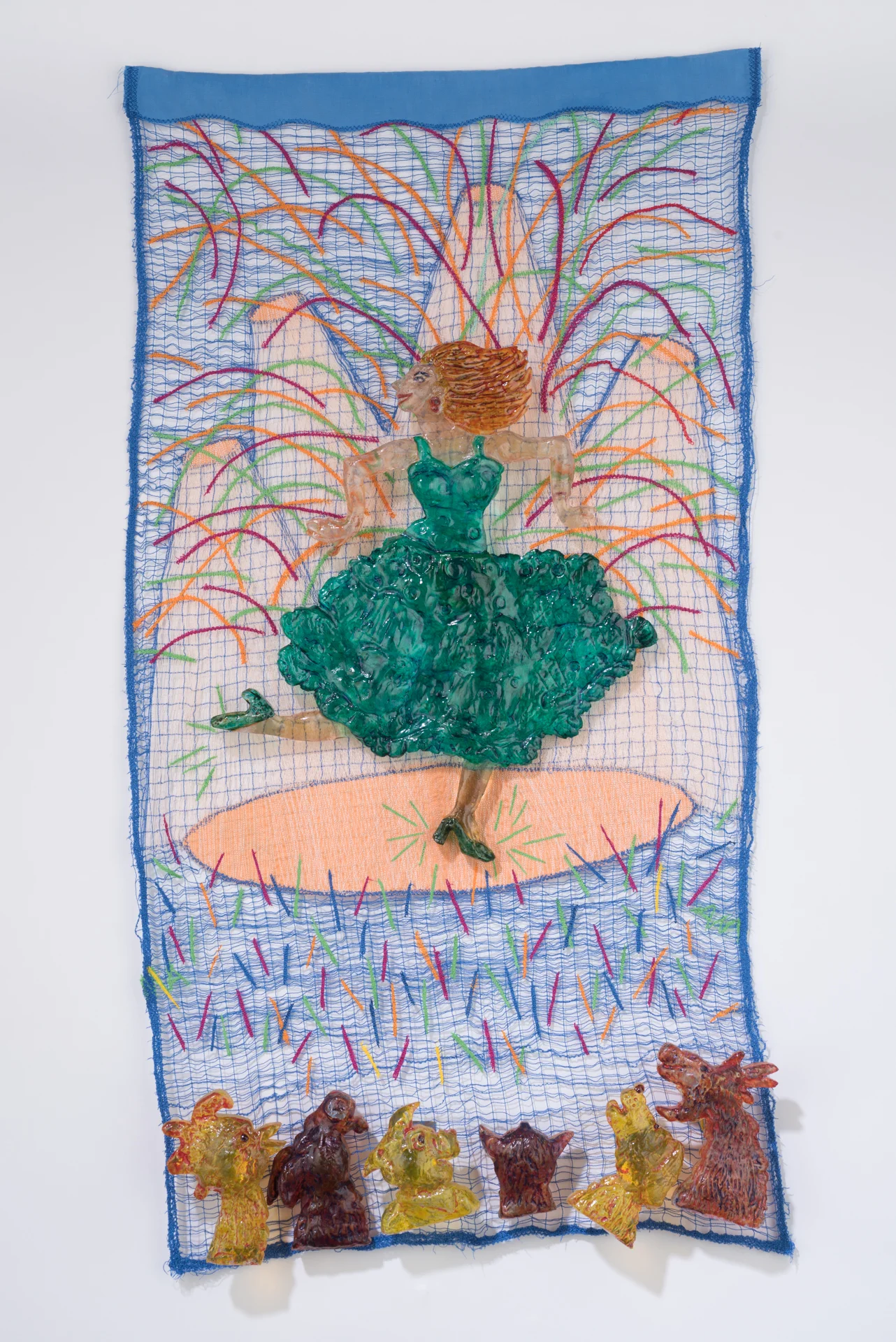 Dancer III, Cast, cut and painted glass shapes wall mounted over a sewn panel, panel is 14"x 28"