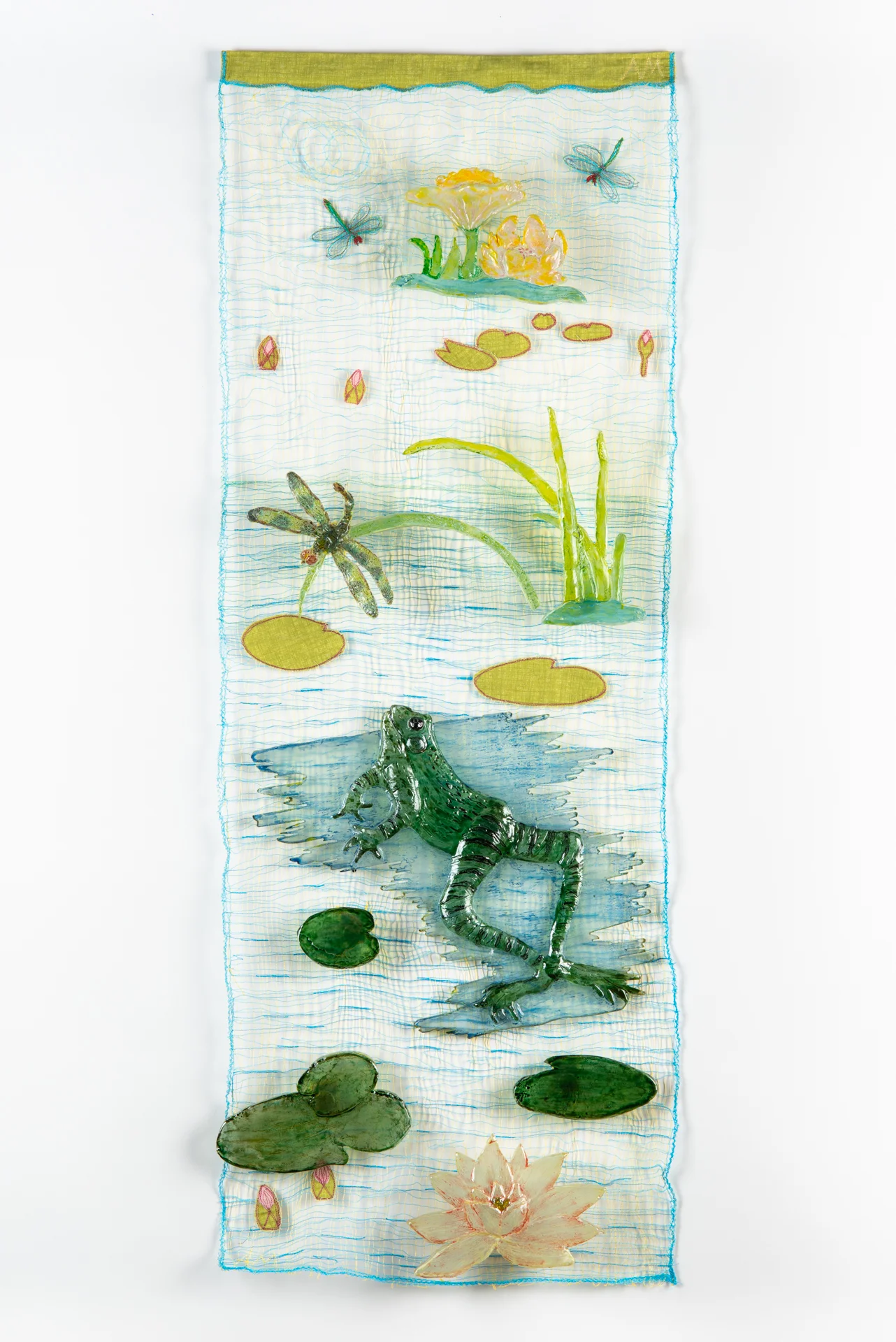 Frog Considers the Dragonfly (Prey in the Garden series), 2018, Eight cast, cut, painted glass shapes mounted over threaded panel, 15"x40"