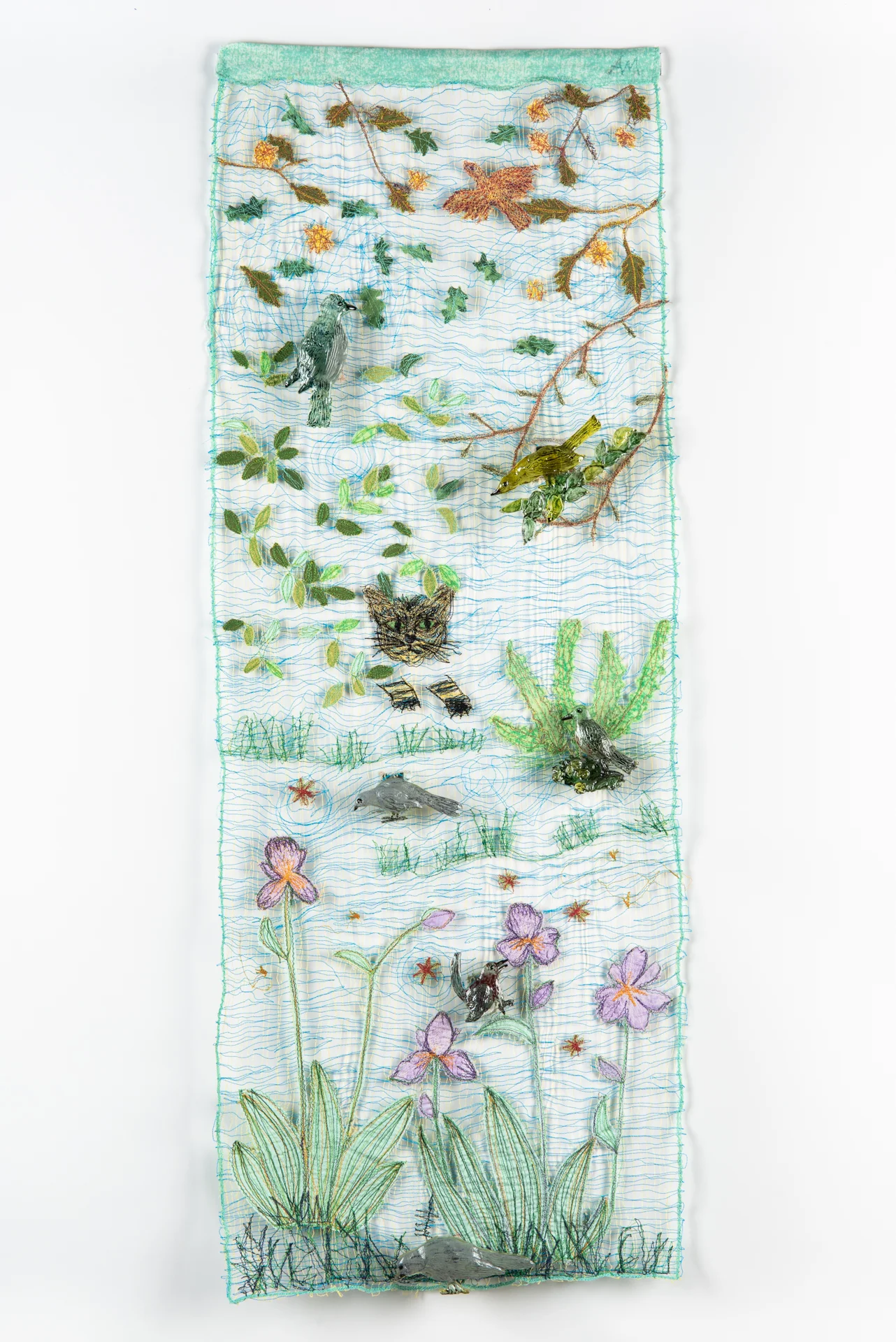 Cat Stalking Birds (Prey in the Garden series), 2018, Six cast, cut, painted glass shapes mounted over threaded panel, 14x39"