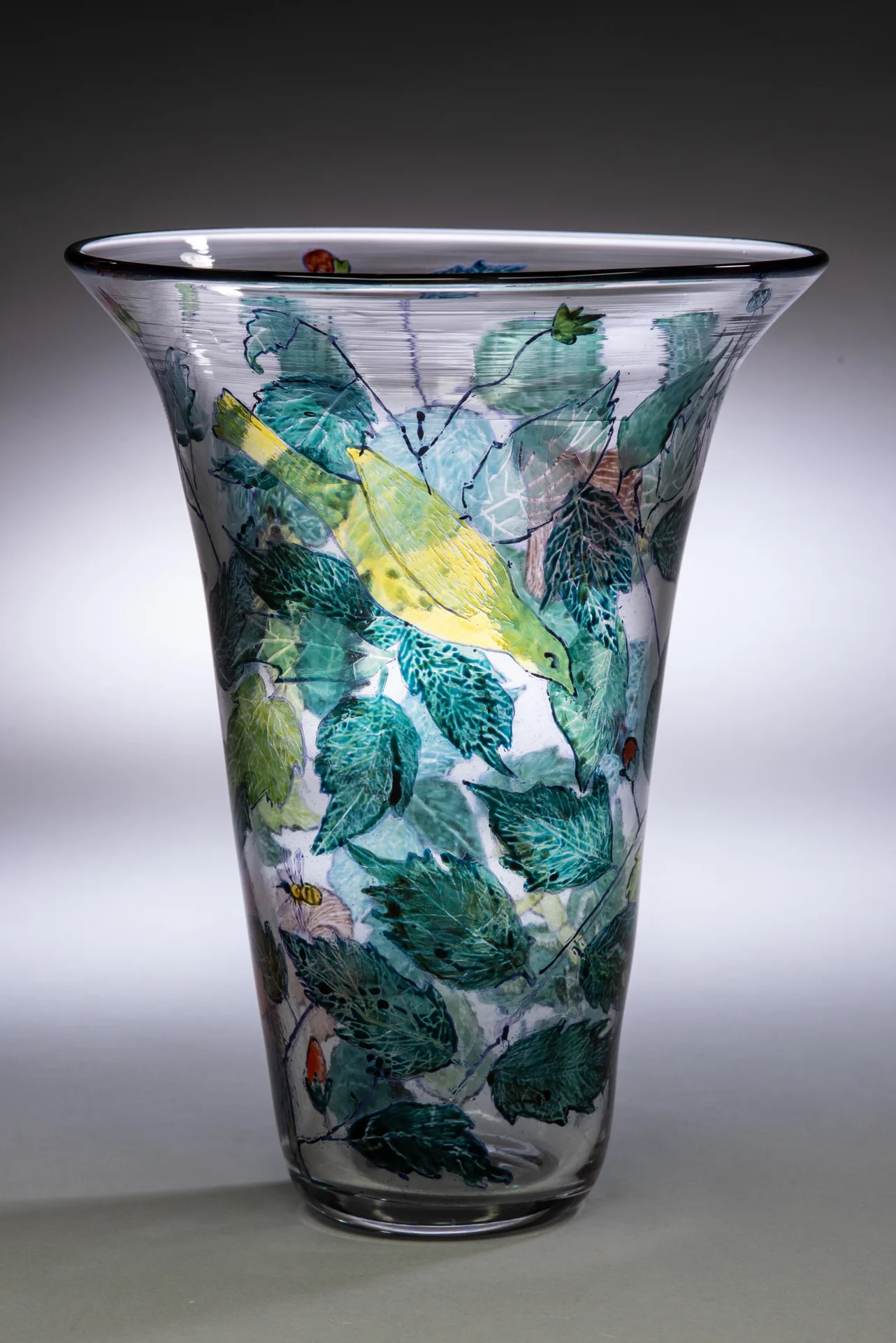 Yellow Bird (Prey in the Garden series), 2018, Vitreous enamels reverse painted on blown glass vessel, 9"tall