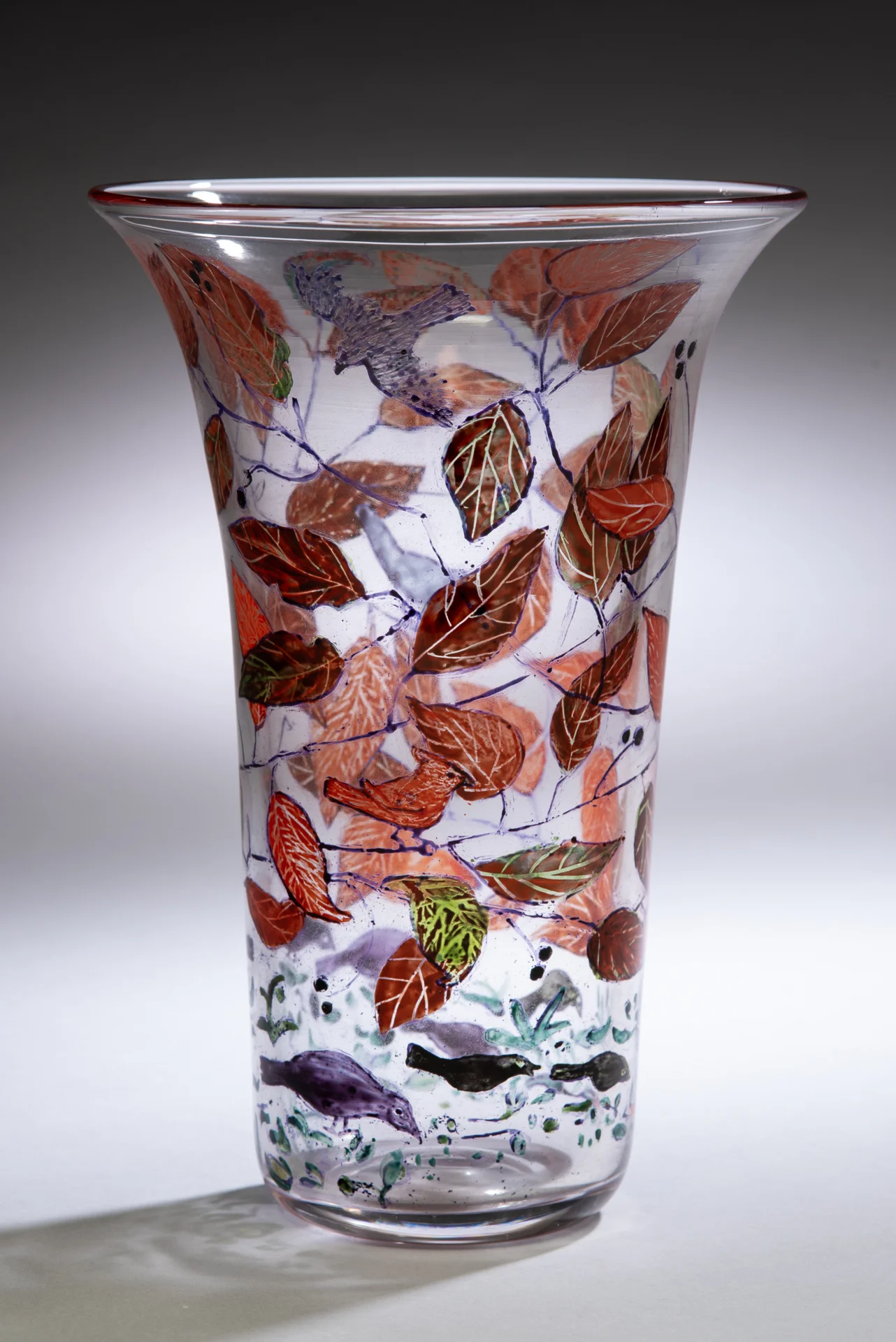 Hawk Hunting (Prey in the Garden series), 2018, Vitreous enamels reverse painted on blown glass vessel, 9"tall