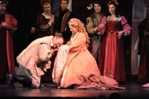 Rick Hilsabeck as Fred Graham/Petruchio and Sarah Pfisterer as Lilli Vanessi/Katherine and ensemble members. (Courtesy Reagle Music Theatre/Herb Philpott) 