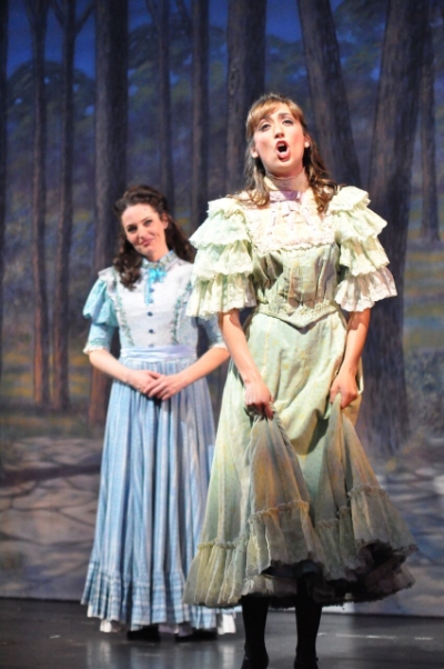 Jennifer Ellis as Julie Jordan (left) and Jessica Kundla as Carrie Pipperidge. Courtesy Reagle Music Theatre/©Herb Philpott