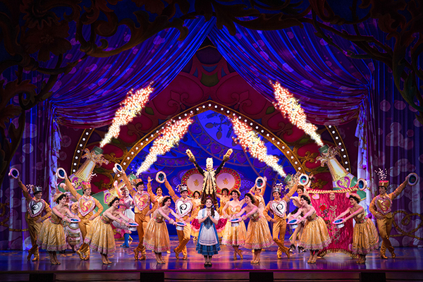 Brooke Quintana as Belle and the cast of Disney's Beauty and the Beast. Photo by Matthew Murphy