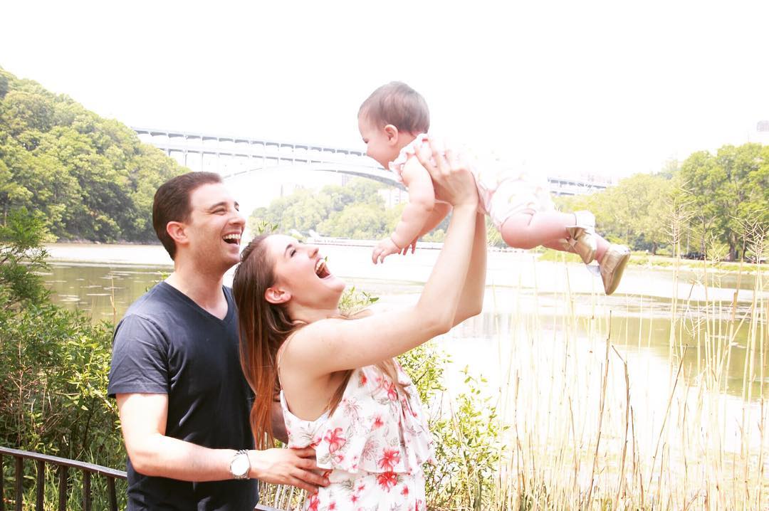 “Goldberg with husband Adam and young daughter Lyla”