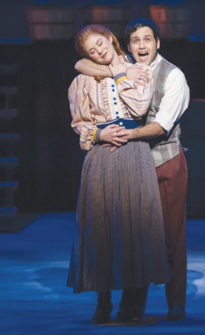 Carrie (Amanda Hootman) and Enoch Snow (Justin Cowden) sing “When the Children Are Asleep” in Musical Theatre West’s Carousel (Caught in the Moment Photography)