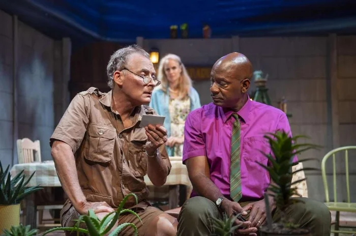 From left: Piet (Victor Talmadge) and Gladys (Werndy vanden Heuvel) hear about the limitations endured by Steve (Adrian Roberts) in "A Lesson From Aloes" at Z Below. (Photo: David Allen)
