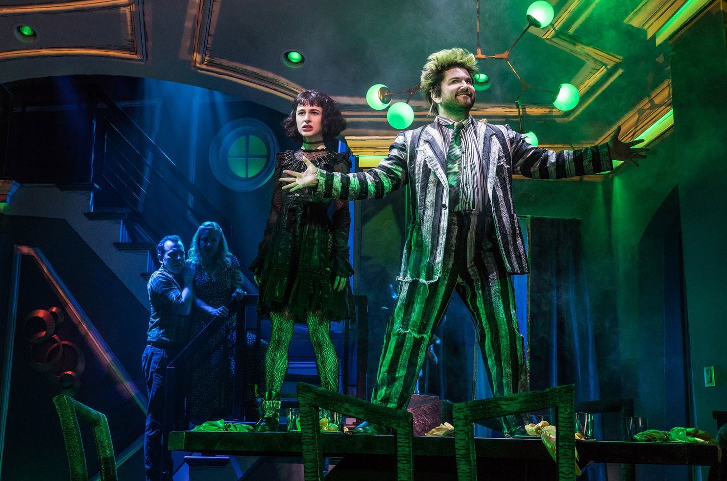 Rob McClure, left, Kerry Butler, Sophia Anne Caruso and Alex Brightman in “Beetlejuice,” now on Broadway. (Matthew Murphy)