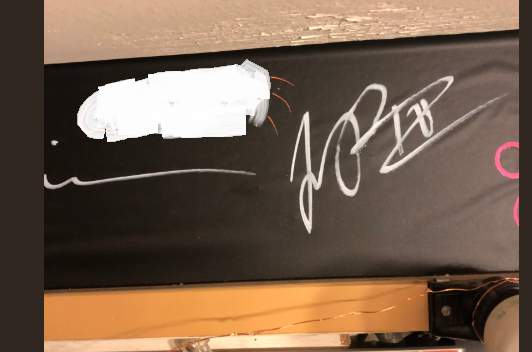 An image of the obscene drawing above Mr. Pierce’s name in the dressing room. Censored by OnStage Blog