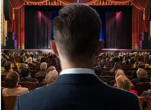 When the Tallest Person in the Room Sits Directly in Front of You…