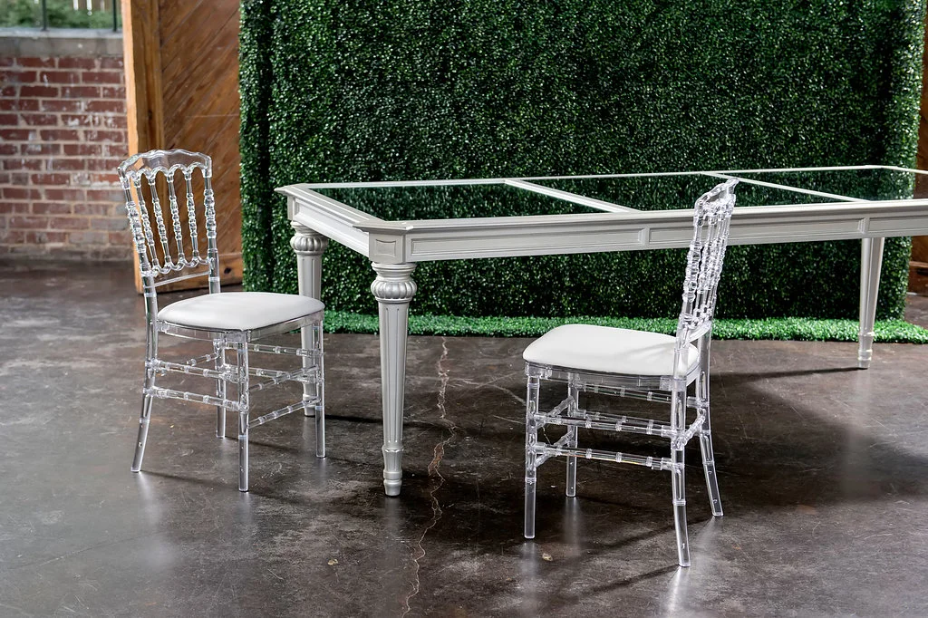 Silver Regency Dining Table with Crystal Napoleon Dining Chairs