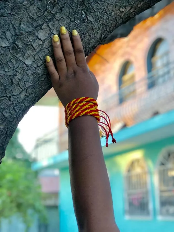 Ismaries’ business Art Lakay makes colorful bracelets and crocheted clothing inspired by Haiti. All of the pieces are made by her and her friends who are living in Haiti.