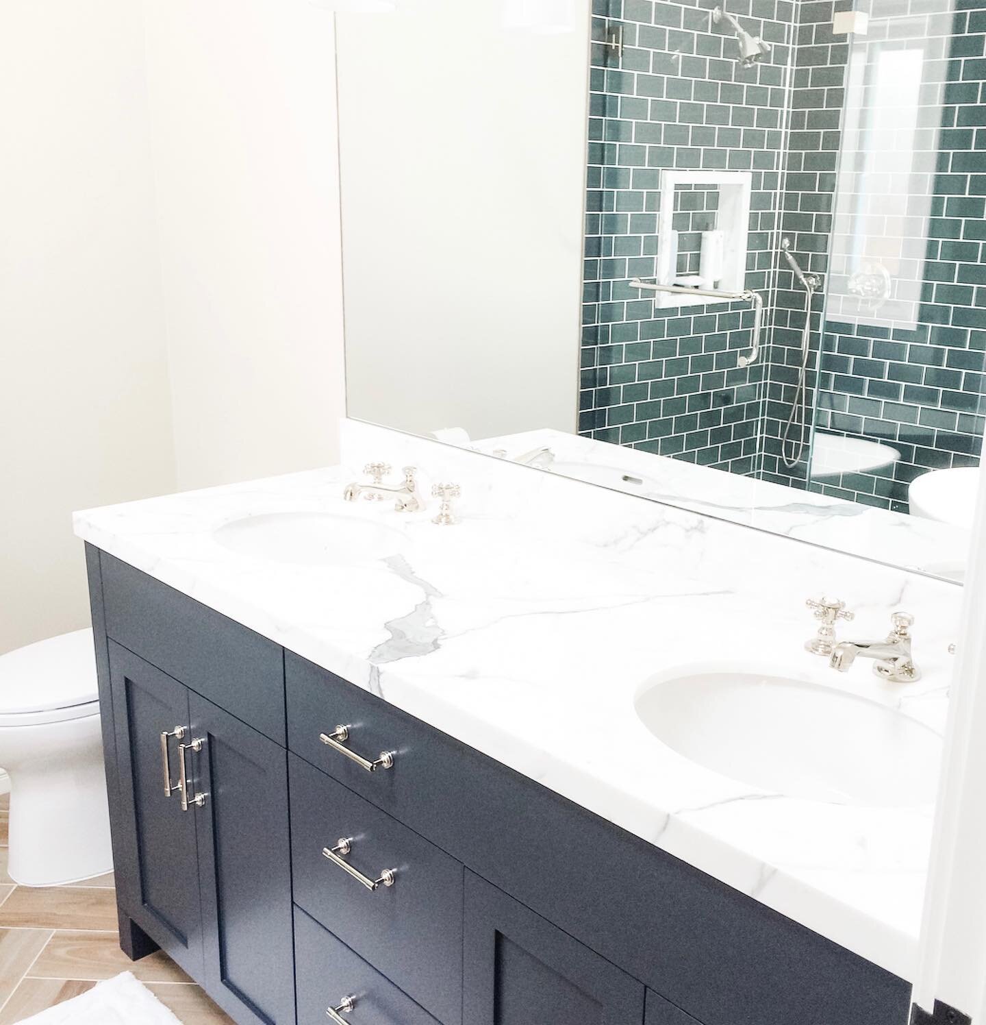 Sometimes my clients are afraid to use a bold color. You do not need to be! This bathroom is the perfect example of using a dark tile while still having a bright, cheery outcome.