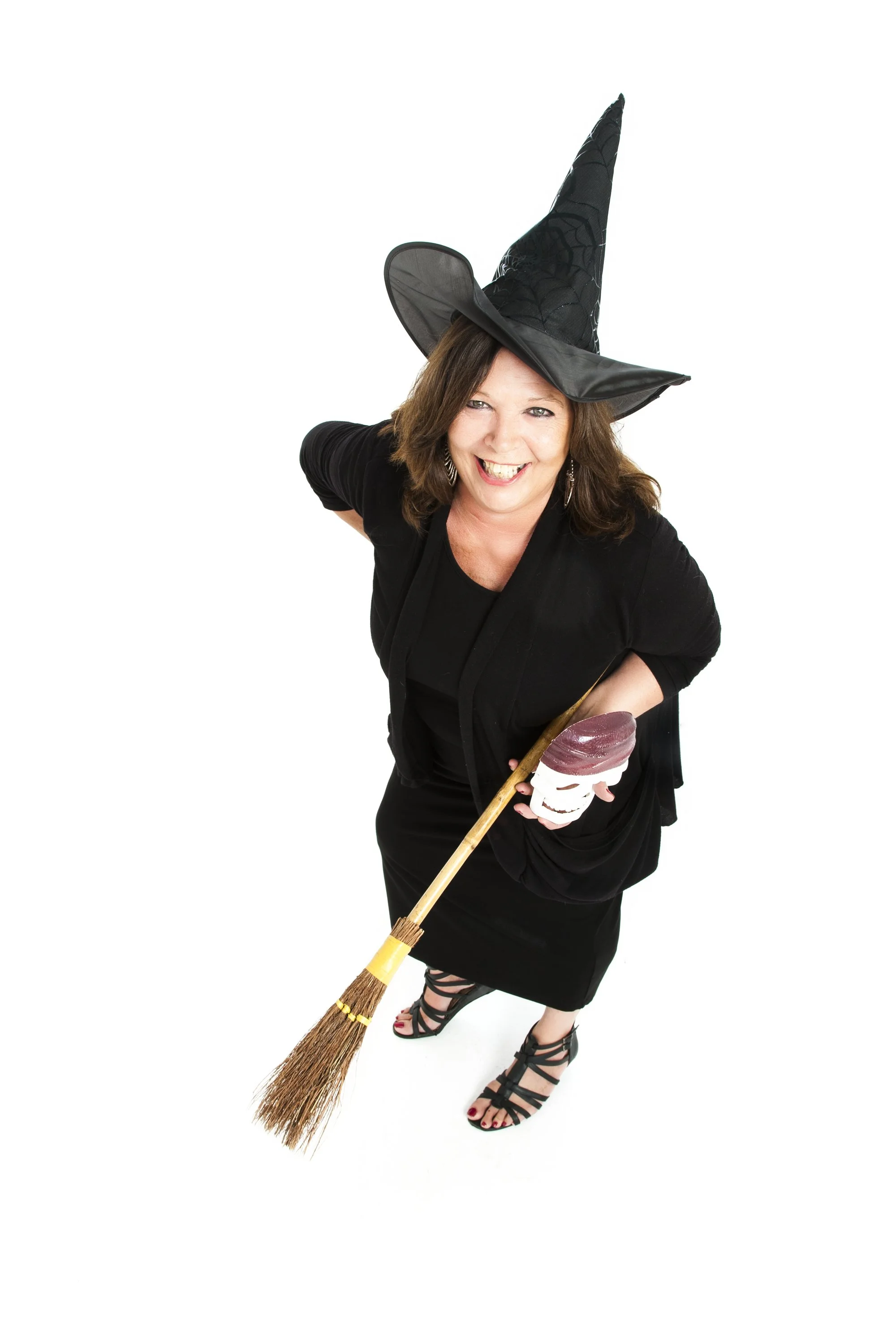 Della, usually brewing her cauldron sized cup of coffee!