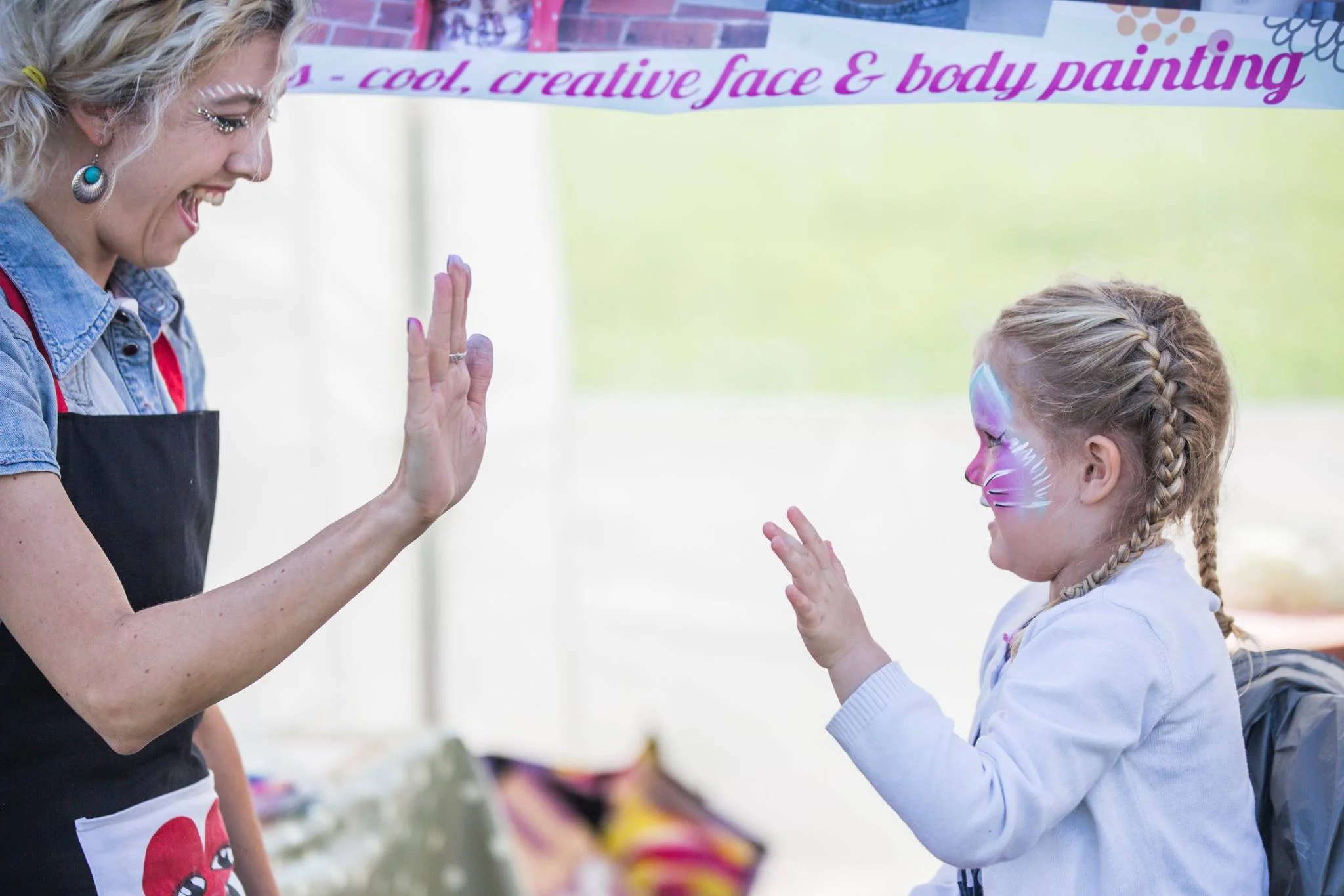 This is how Natasha got the name Hi5! For obvious reasons, she needed to give the kids the highest of fives.
