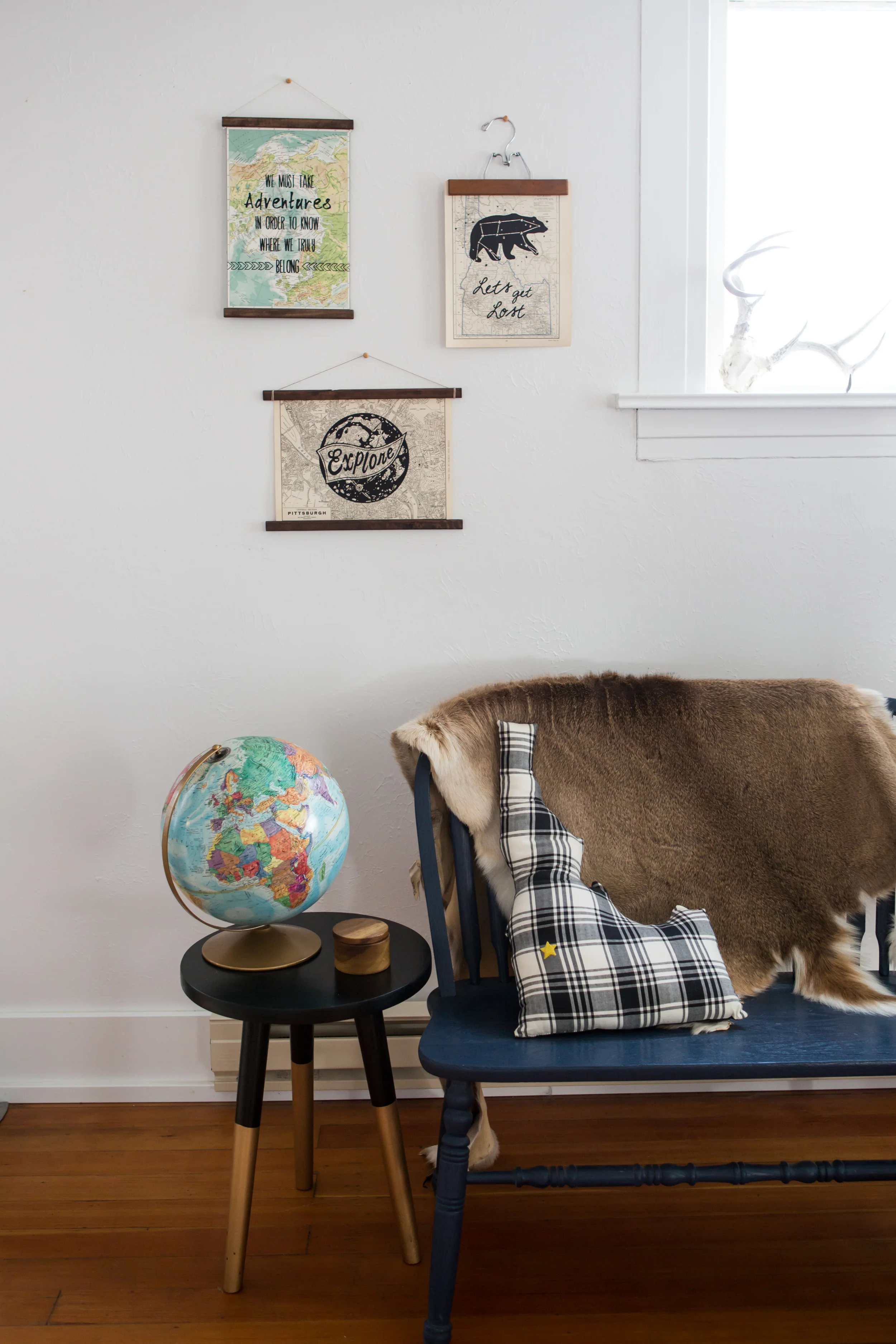 DESIGN TIP: wood pant hangers is another great non-conventional and affordable way to hang prints and easily swap them out from season to season. 