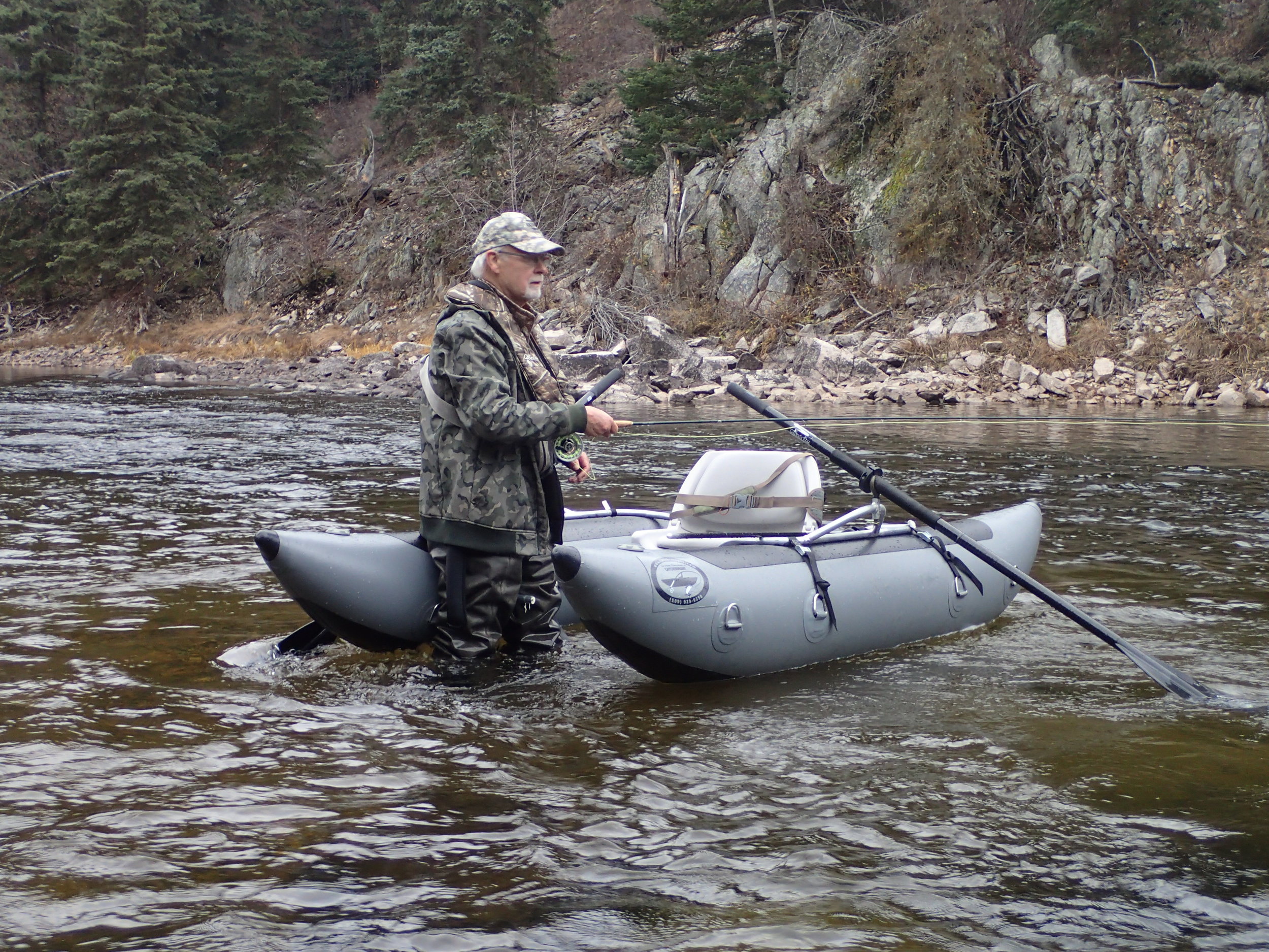 Ken fishing for rainbow trout in Canada.