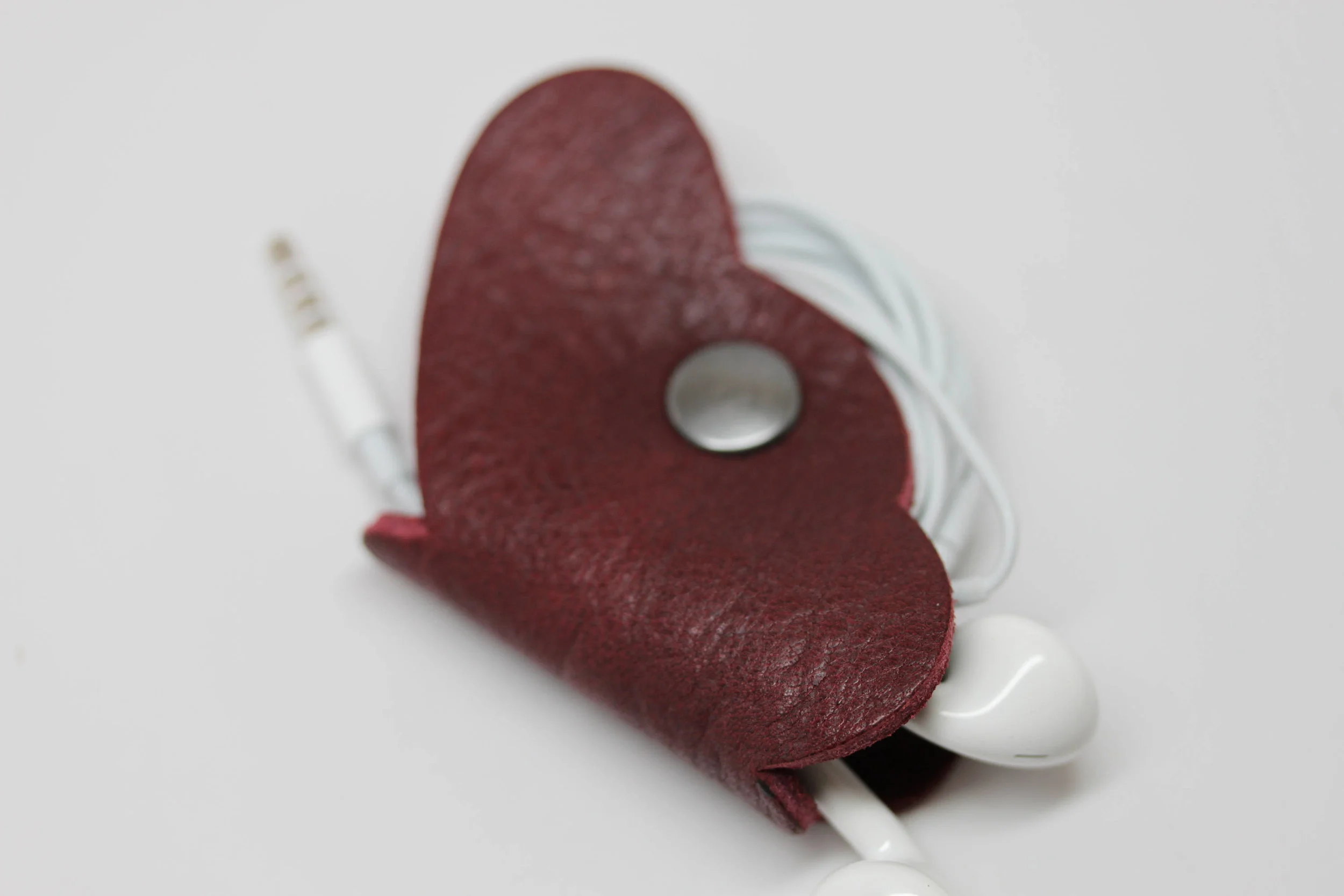 Leather, butterfly, earbud, cord, keeper, organizer, holder