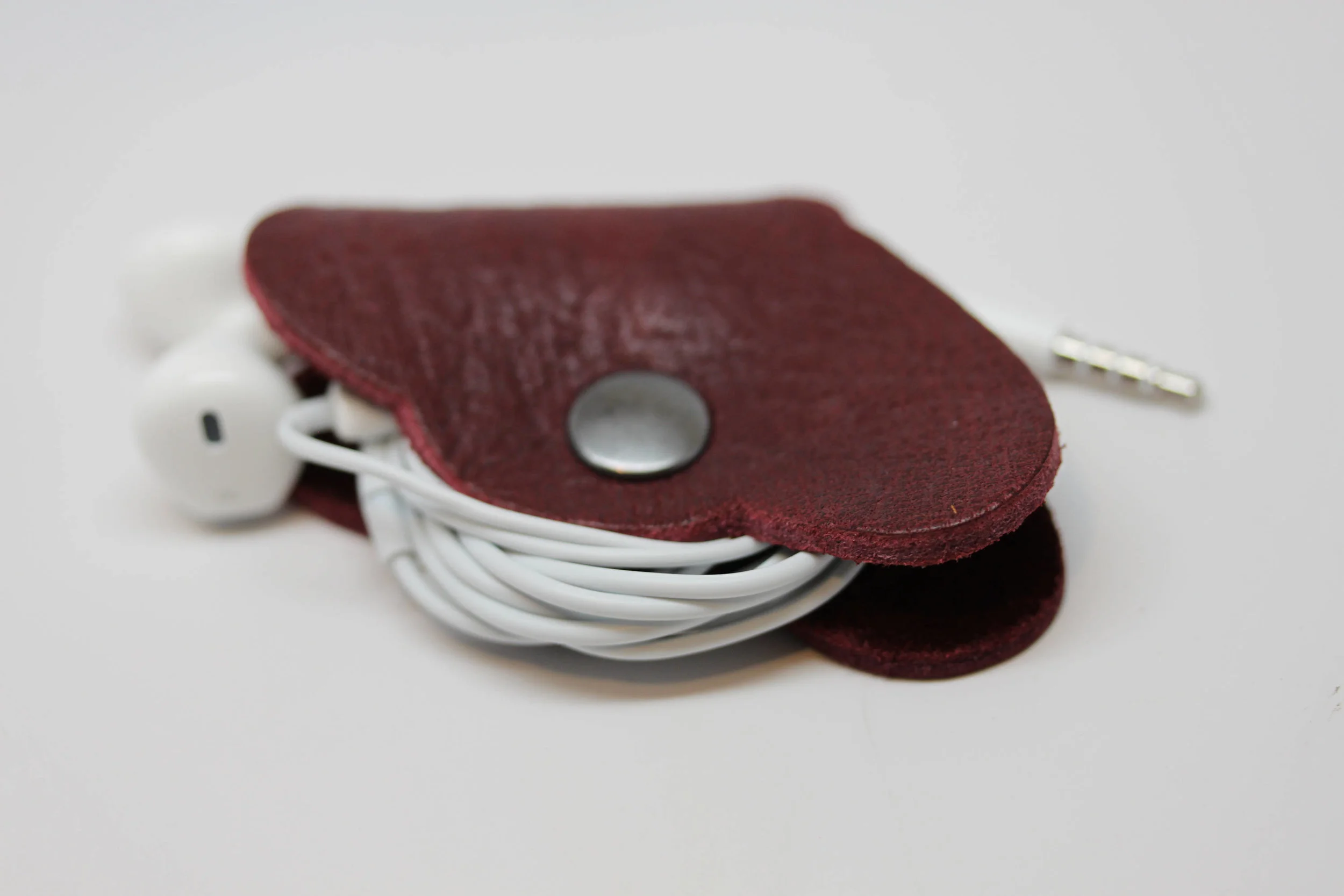 Leather, butterfly, earbud, cord, keeper, organizer, holder