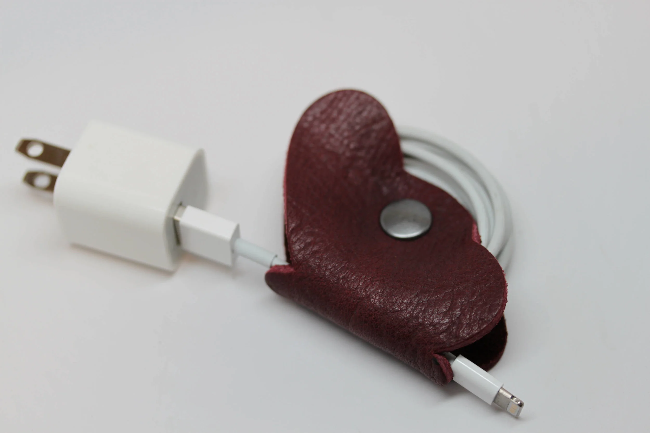 Leather, butterfly, earbud, cord, keeper, organizer, holder