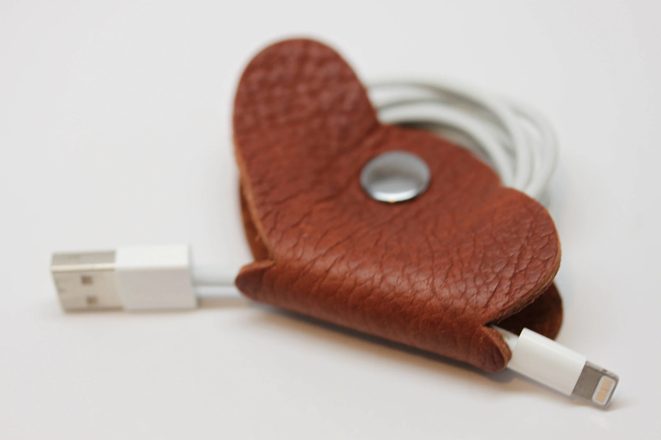 Leather, butterfly, earbud, cord, keeper, organizer, holder