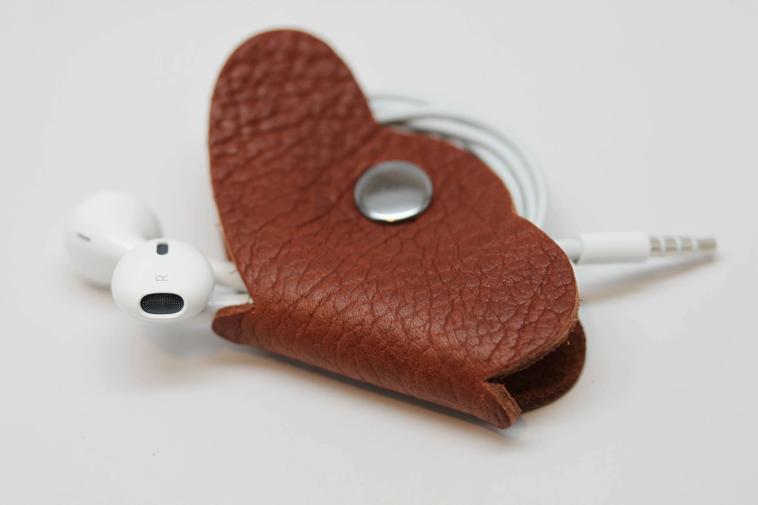 Leather, butterfly, earbud, cord, keeper, organizer, holder