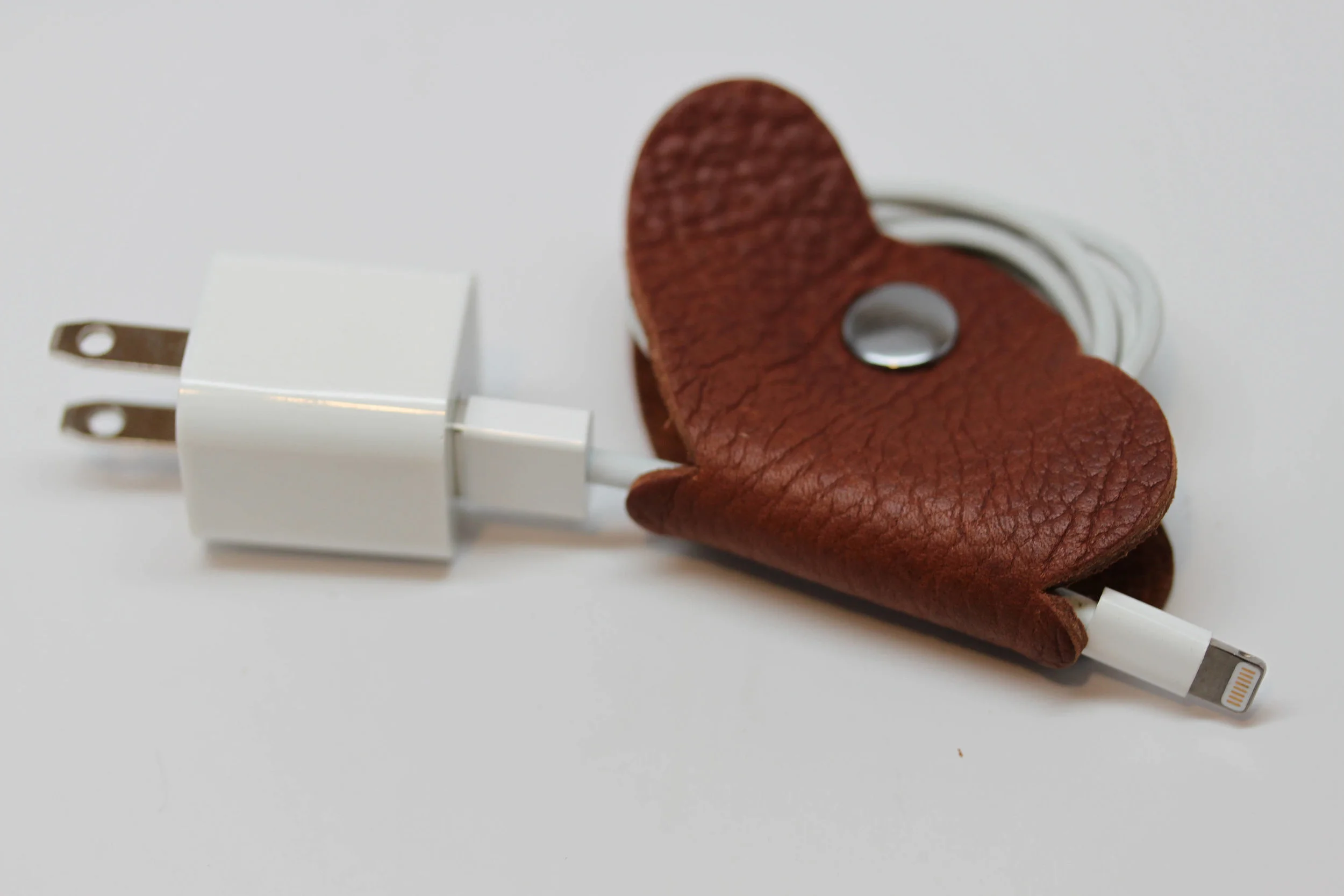 Leather, butterfly, earbud, cord, keeper, organizer, holder