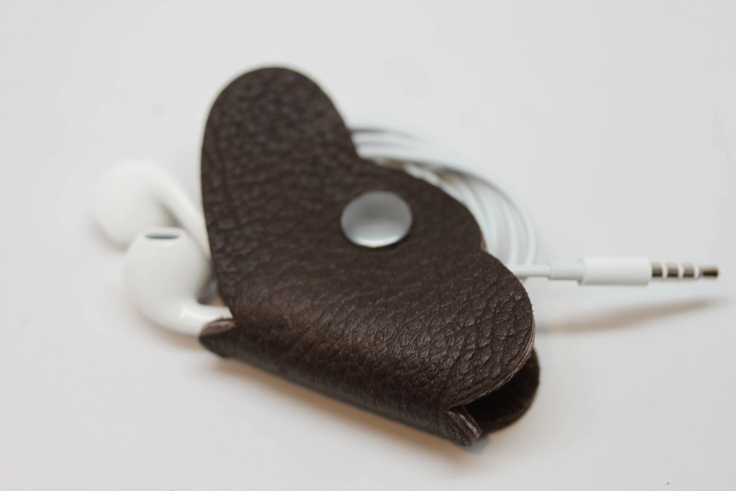 Leather, butterfly, earbud, cord, keeper, organizer, holder