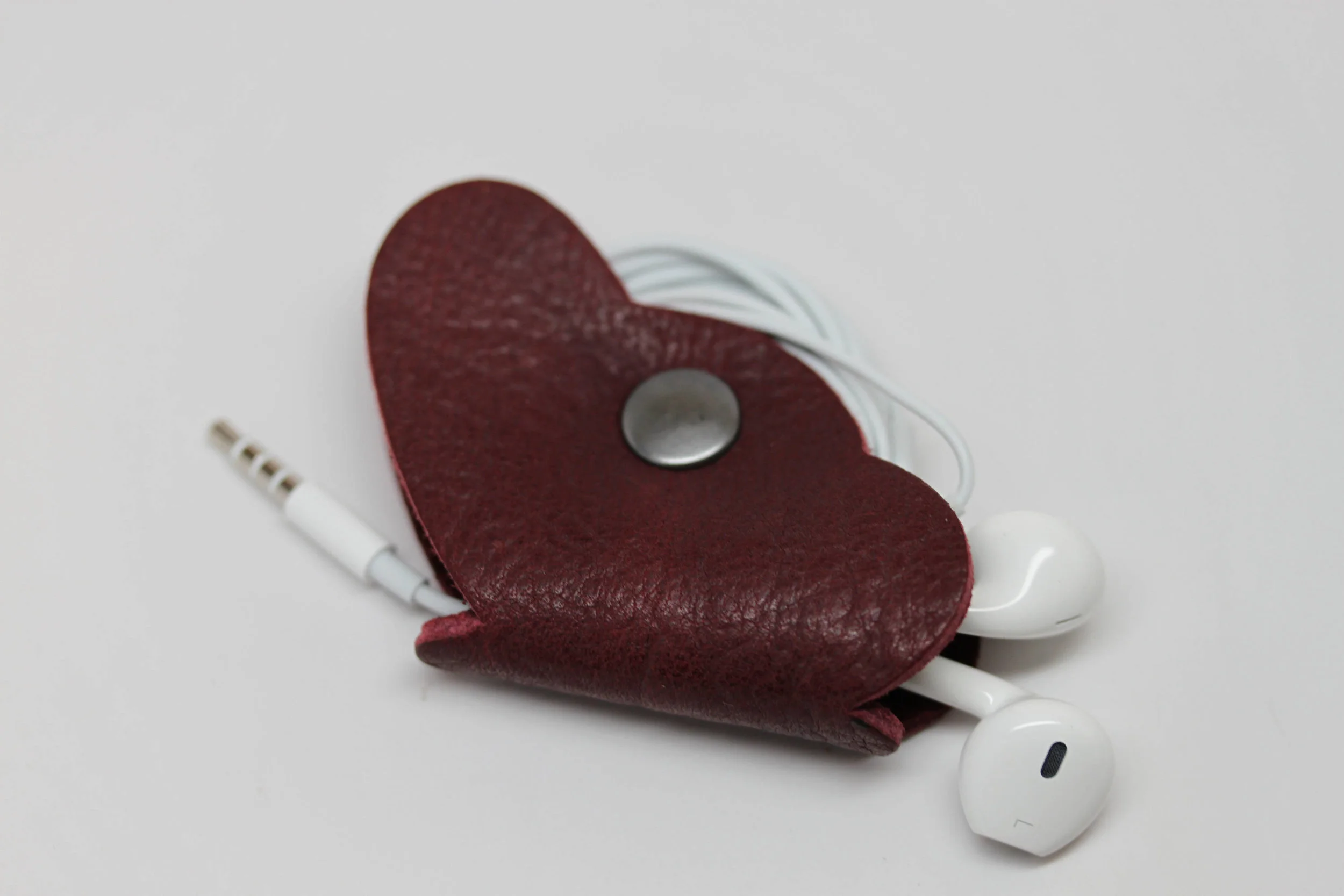 Leather, butterfly, earbud, cord, keeper, organizer, holder