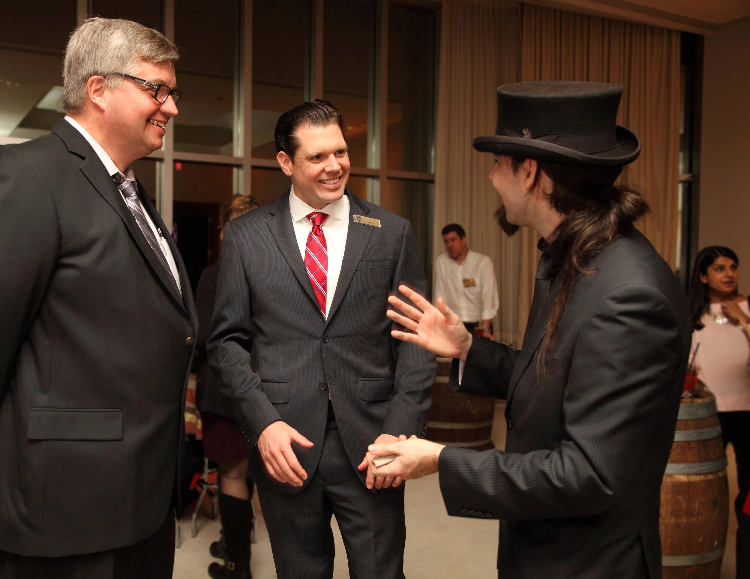 Spencer Scurr Performs Strolling Magic at a Corporate Event.