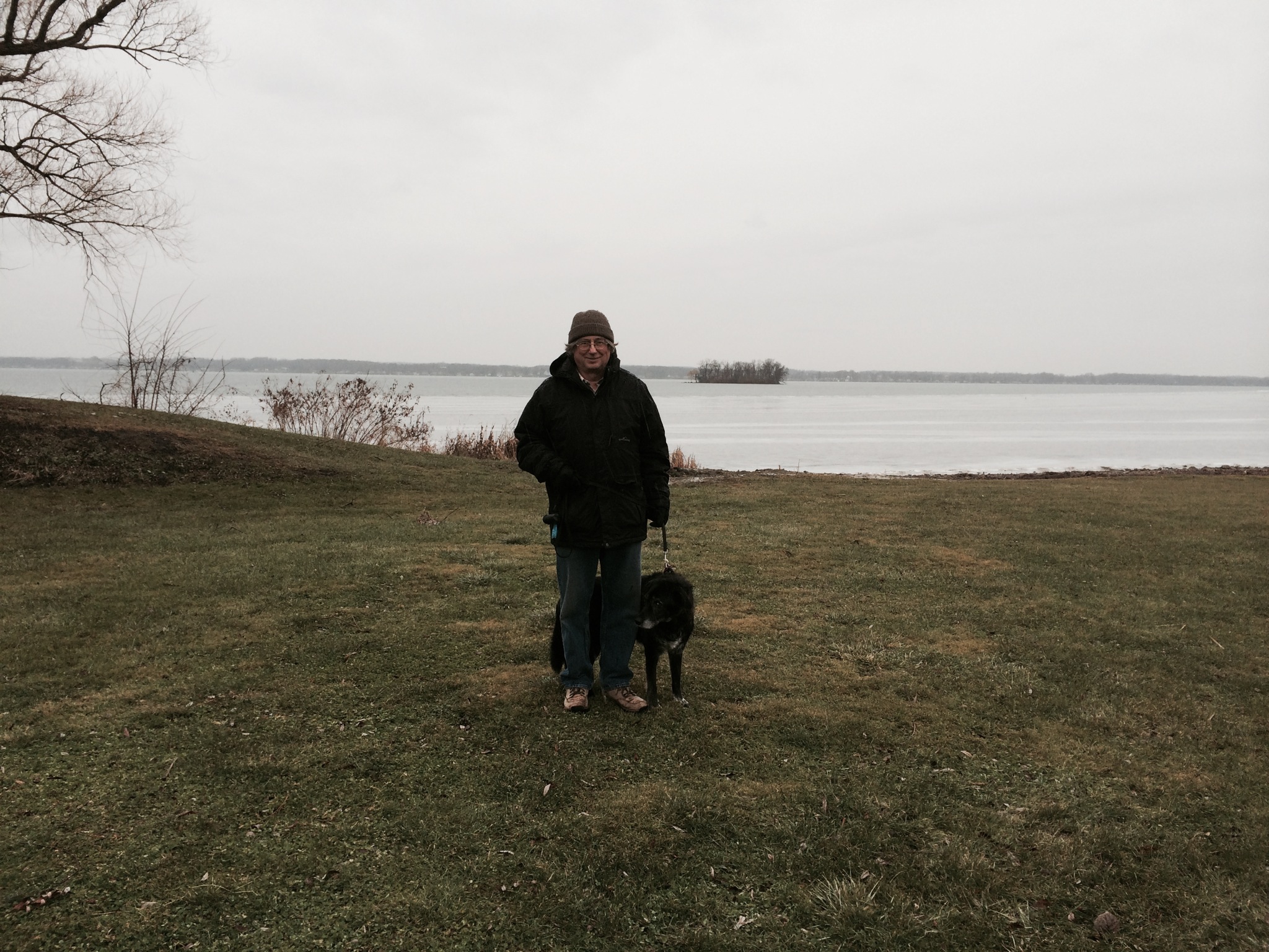 Ed and Alice at the Cayuga Lake Shore with Frontenac Island in the background