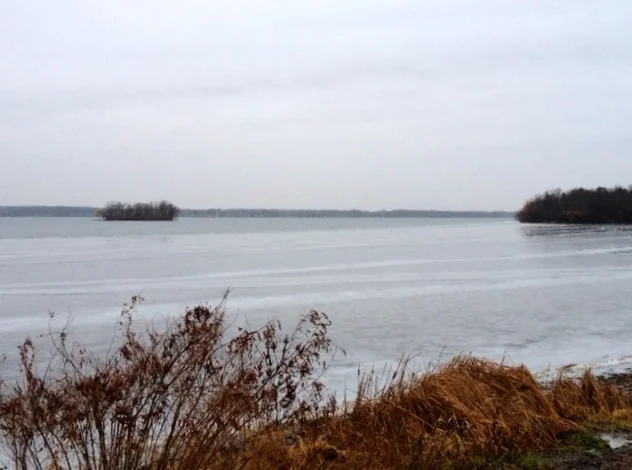 Frontenac Island sits just off the east shore of Cayuga Lake. A short distance to the north, the Cayuga Lake outlet connects to a network of water travel routes. 