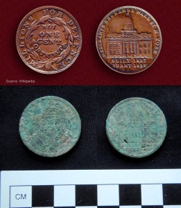 This 1837 Merchant’s Exchange Hard Times token (bottom) was found in the clay spoil layer below the Dasch family midden at 15 Alexander Street. An uncorroded example is provided for comparison (top).