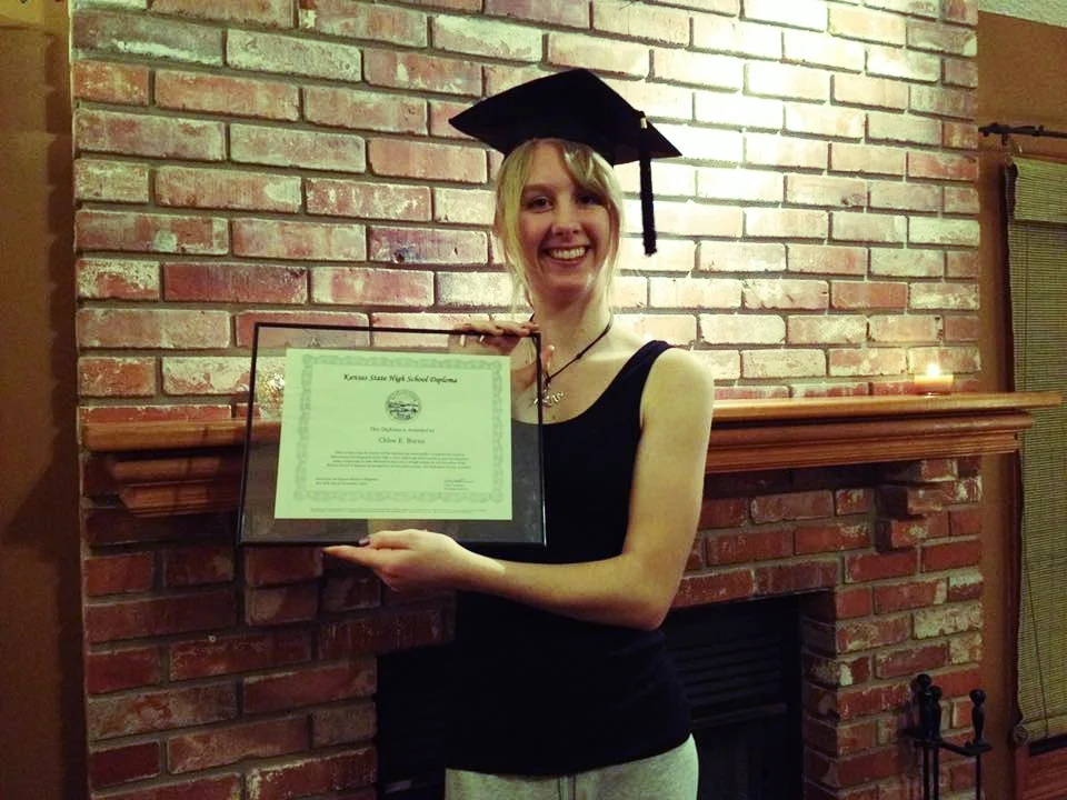 My at-home graduation after taking my GED at 16, in 2013.