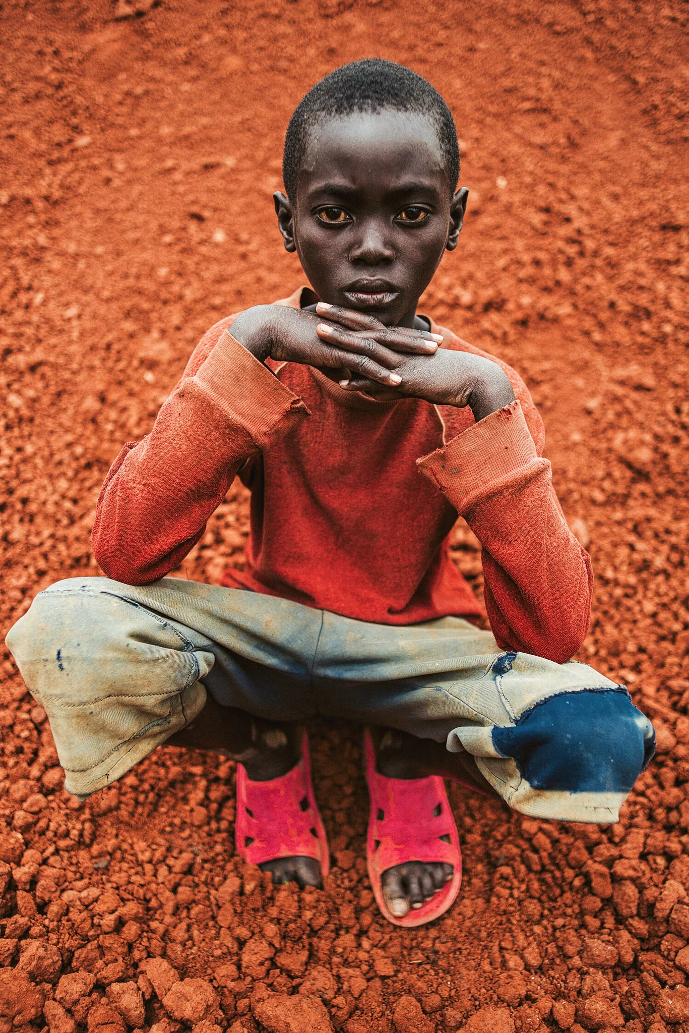 A boy outside his home in Rwanda. Love Volunteer project 2015.
