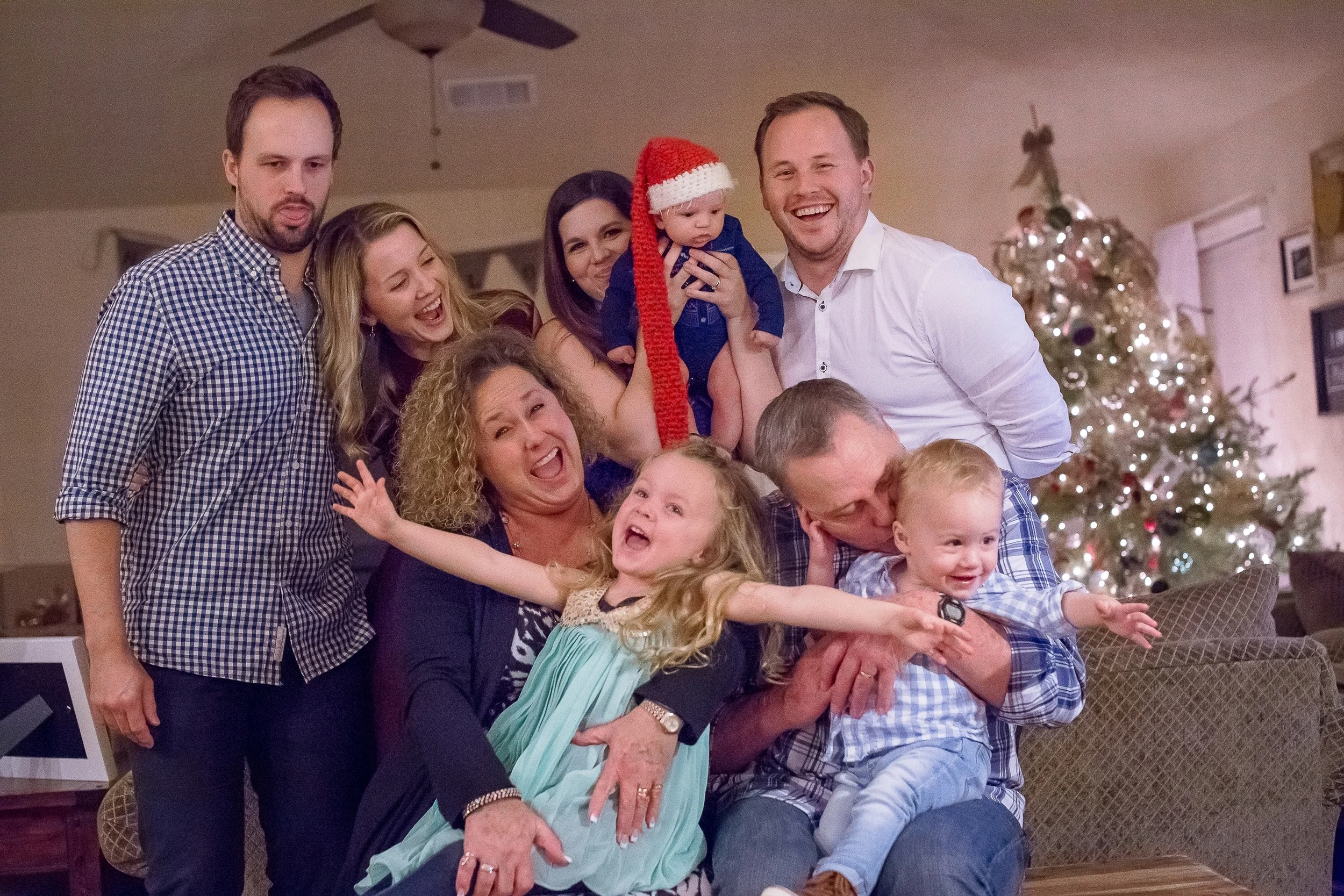 This pic was taken on Christmas Eve of Jess and I along with my brother Bryan, his wife Shanna and their 2 month old son Ethan. My parents were the lucky ones who got to hold our crazy kids. 