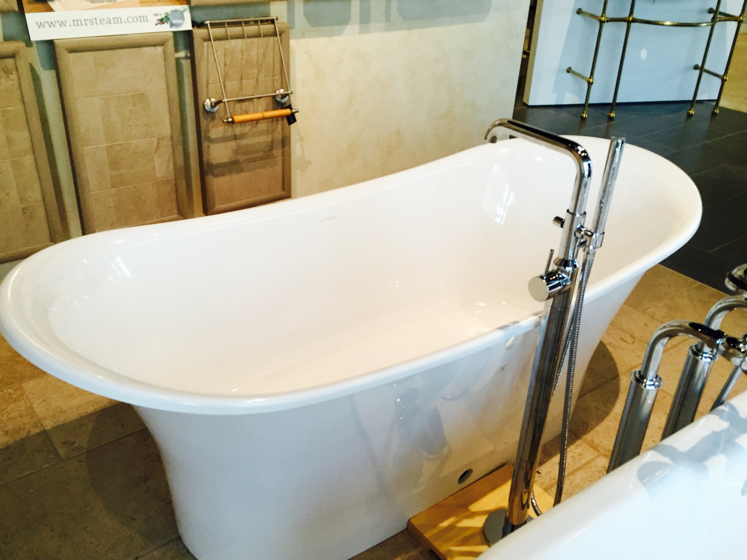 I fell in love with this resin and acrylic Toulouse tub when I saw it online since I'm definitely drawn toward the slipper style. In person, it was way too long for me and therefore not too comfy.