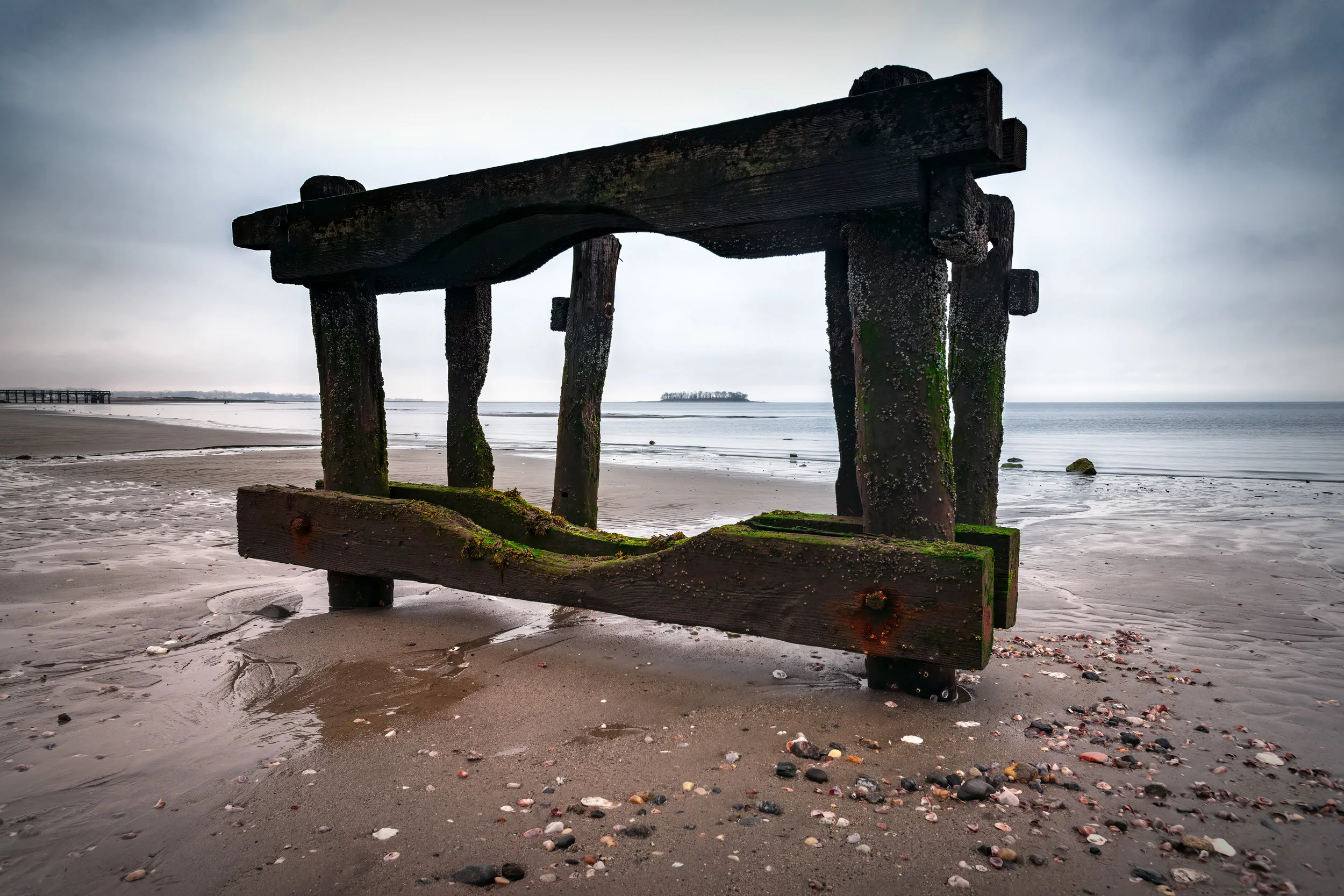Immersed in the moment, a dynamic scene comes together as the elements change even more. Time seems to slow down as the sky changes slowly from gray to faint blue, the old structure before me acts as a prehistoric television bringing me the latest nature programming.