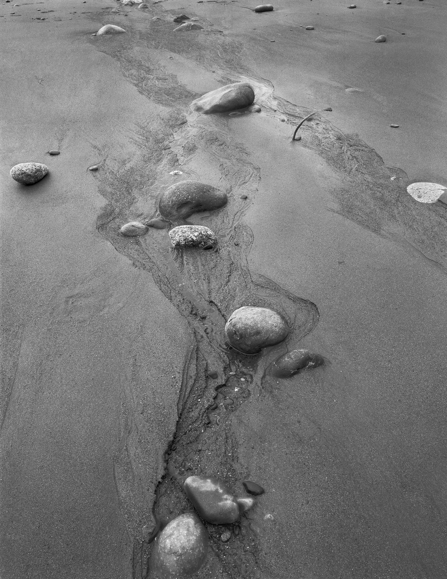stones-on-sand-channel.jpg