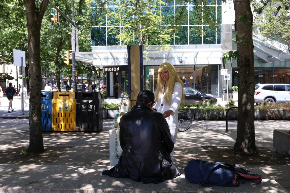 Lichen Cult Street Performance, Vancouver, 2024. Distributing free Lichen Cult brochures to members of the public.