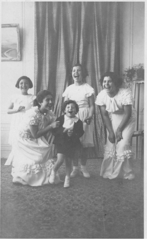 Being doted over by older sister Sulafa, and cousins