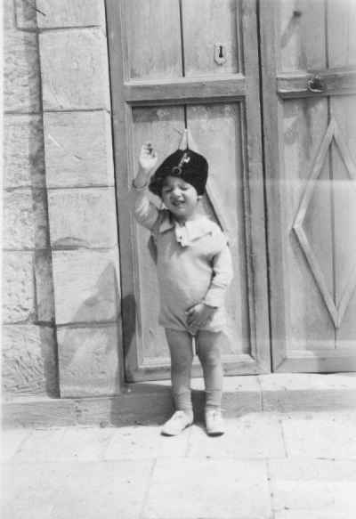 Usama playing soldier at age 2